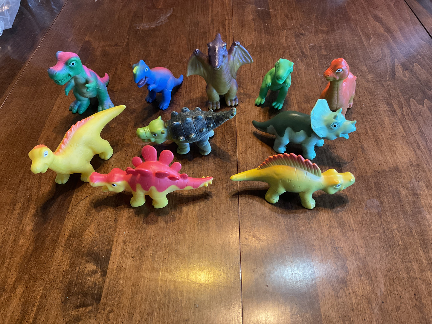 Set of 10 rubber squeezable dinosaurs